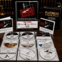 Platinum Power Pack featuring Know Your Rights book, CDs and DVDs displayed on a wooden desk with legal book background
